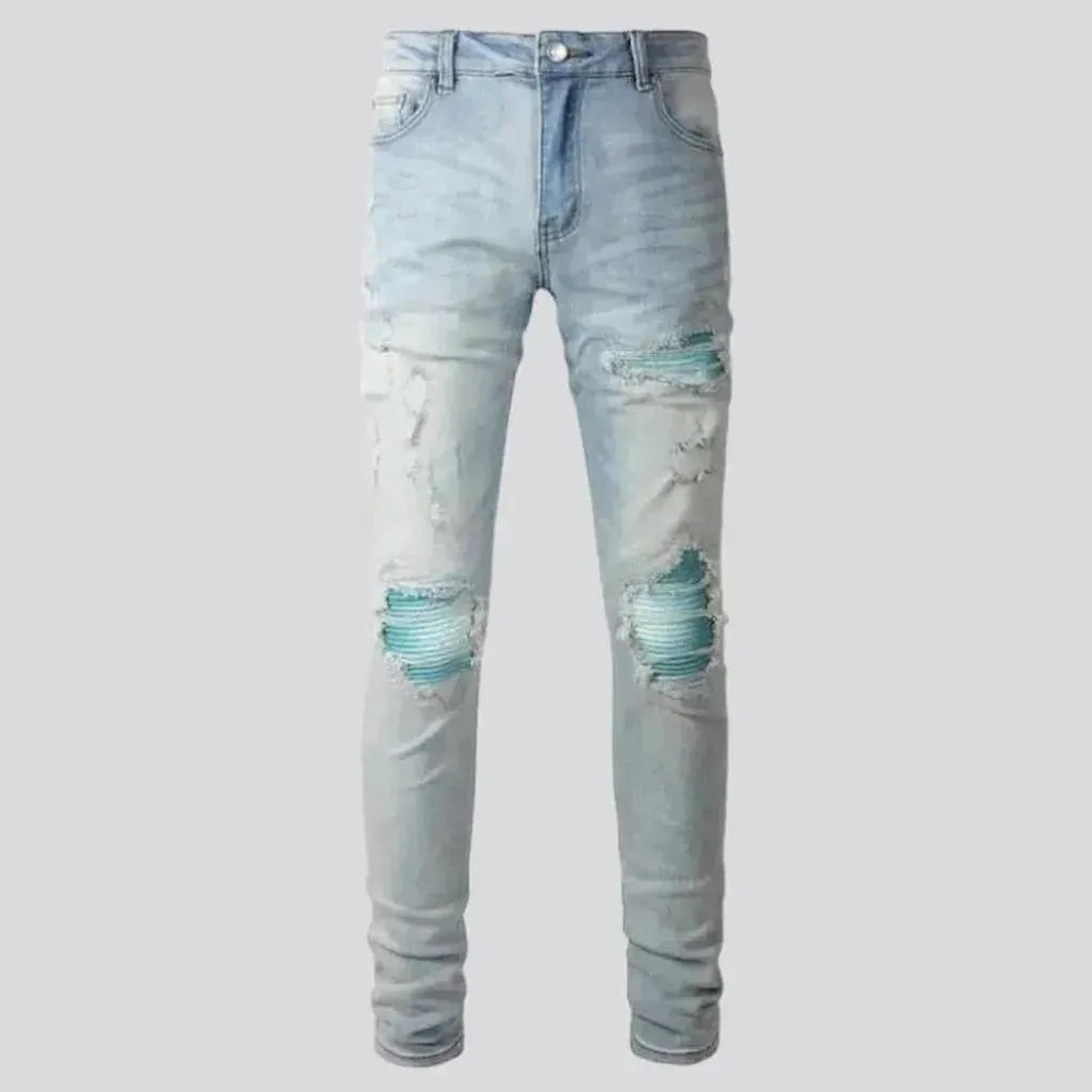 Grunge men's light-wash jeans